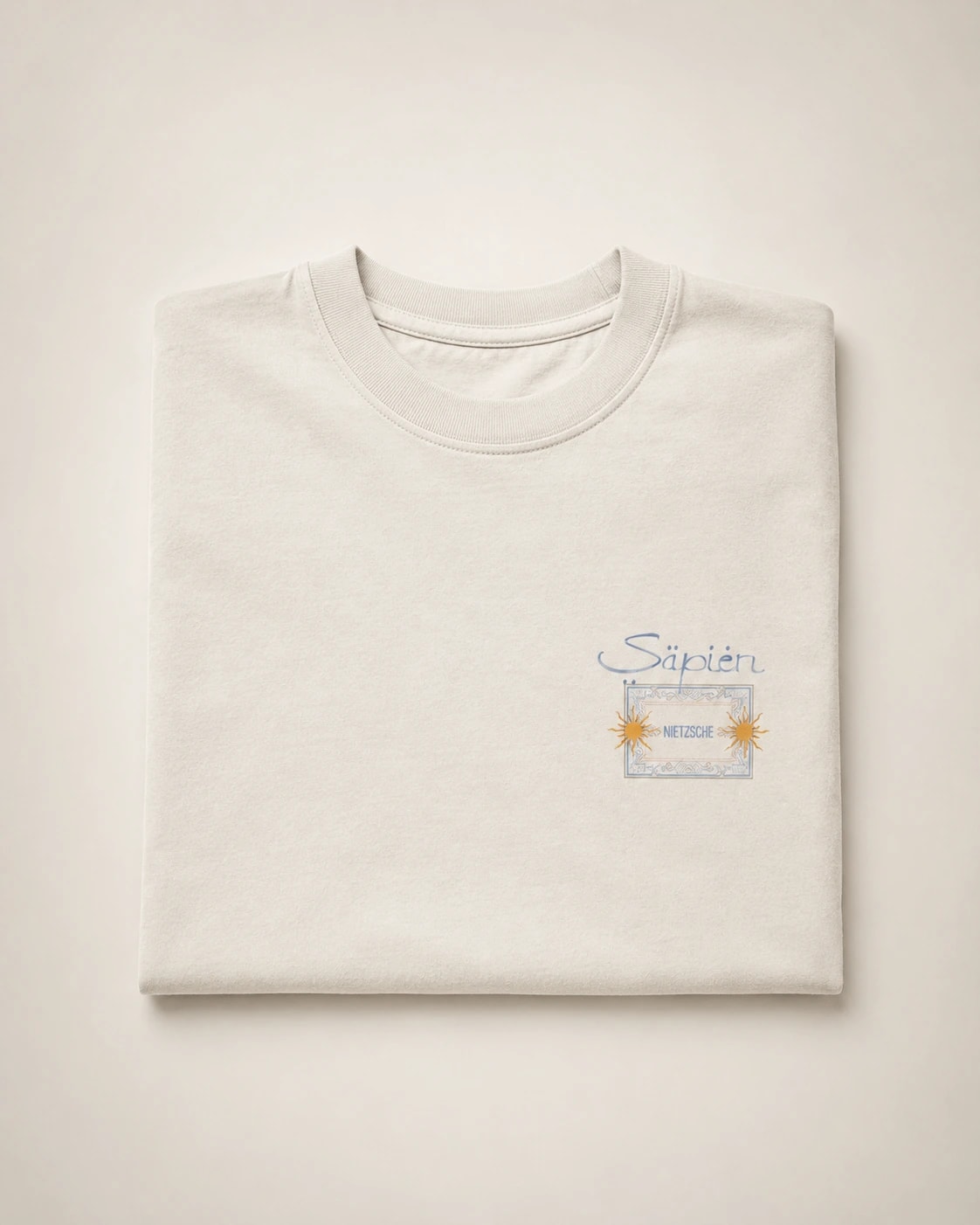 Friedrich Nietzsche Tee, Faded Bone, folded flat